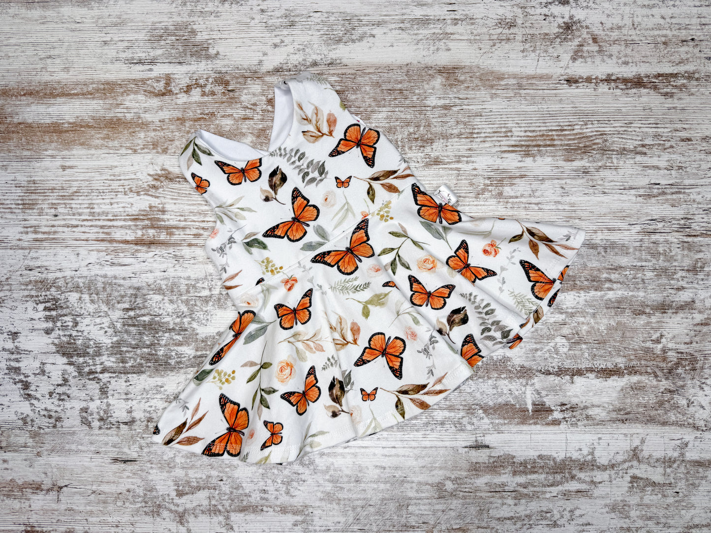 Cross back Twirl Peplum-Monarch