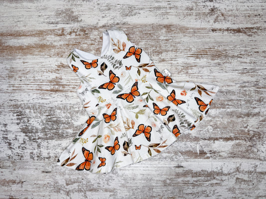 Cross back Twirl Peplum-Monarch